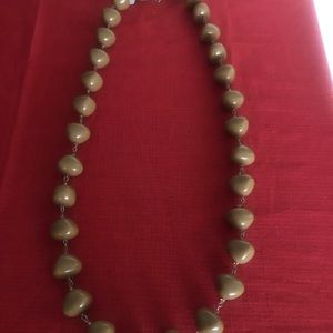 Troy designs tan beaded necklace.